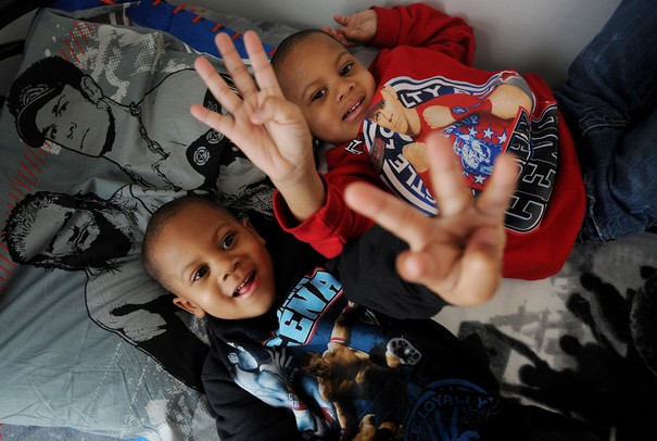 Four-year-old twin brothers Caine and Carter Flowers pose for a photo. The pair will celebrate their fourth birthday on Leap Day, February 29. Melanie Maxwell I AnnArbor.com